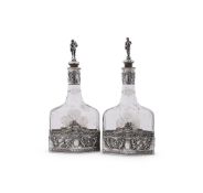 A PAIR OF GERMAN SILVER MOUNTED DECANTERS