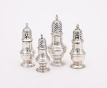 FOUR SILVER BALUSTER PEPPERETTES