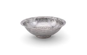 A SILVER COLOURED BOWL
