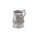 A GEORGE III SILVER BALUSTER MUG