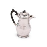 AN EDWARDIAN SILVER BALUSTER HOT WATER POT