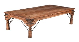 AN INDIAN HARDWOOD AND METAL BOUND LOW CENTRE TABLE