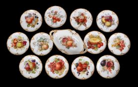 A BERLIN PORCELAIN COMPOSITE PART DESSERT SERVICECIRCA 1890 painted with fruit within a moulded an