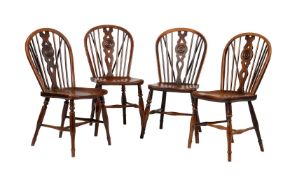 A SET OF FOUR FRUITWOOD, ASH, AND ELM STICK BACK DINING CHAIRS