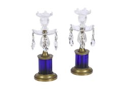 A PAIR OF GILT METAL AND CUT GLASS CANDLESTICKS IN GEORGE III STYLE