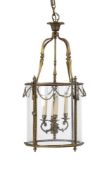 A GILT BRONZE AND GLASS DRUM LANTERN