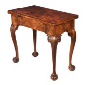 A GEORGE III FIGURED WALNUT AND FEATHER BANDED CARD TABLE