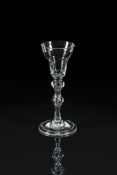 A PAN-TOPPED BALUSTROID WINE GLASS