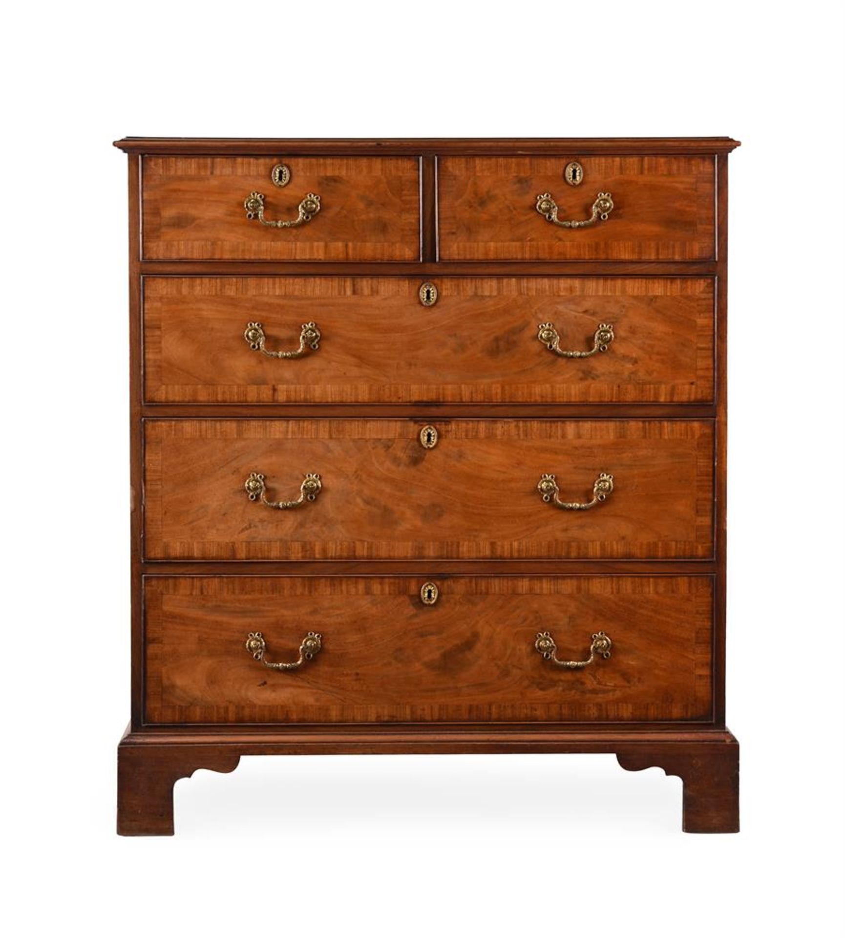 A GEORGE III MAHOGANY AND CROSSBANDED CHEST OF DRAWERS IN THE MANNER OF THOMAS CHIPPENDALE