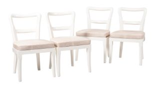 A SET OF FOUR ITALIAN WHITE PAINTED AND COW-HIDE UPHOLSTERED SIDE CHAIRS