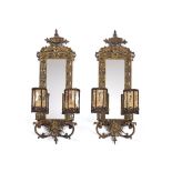 A PAIR OF PIERCED BRASS WALL SCONCES