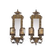A PAIR OF PIERCED BRASS WALL SCONCES