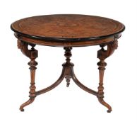 A VICTORIAN WALNUT AND EBONISED CENTRE TABLE