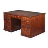 A VICTORIAN MAHOGANY DESK IN GEORGE III STYLE