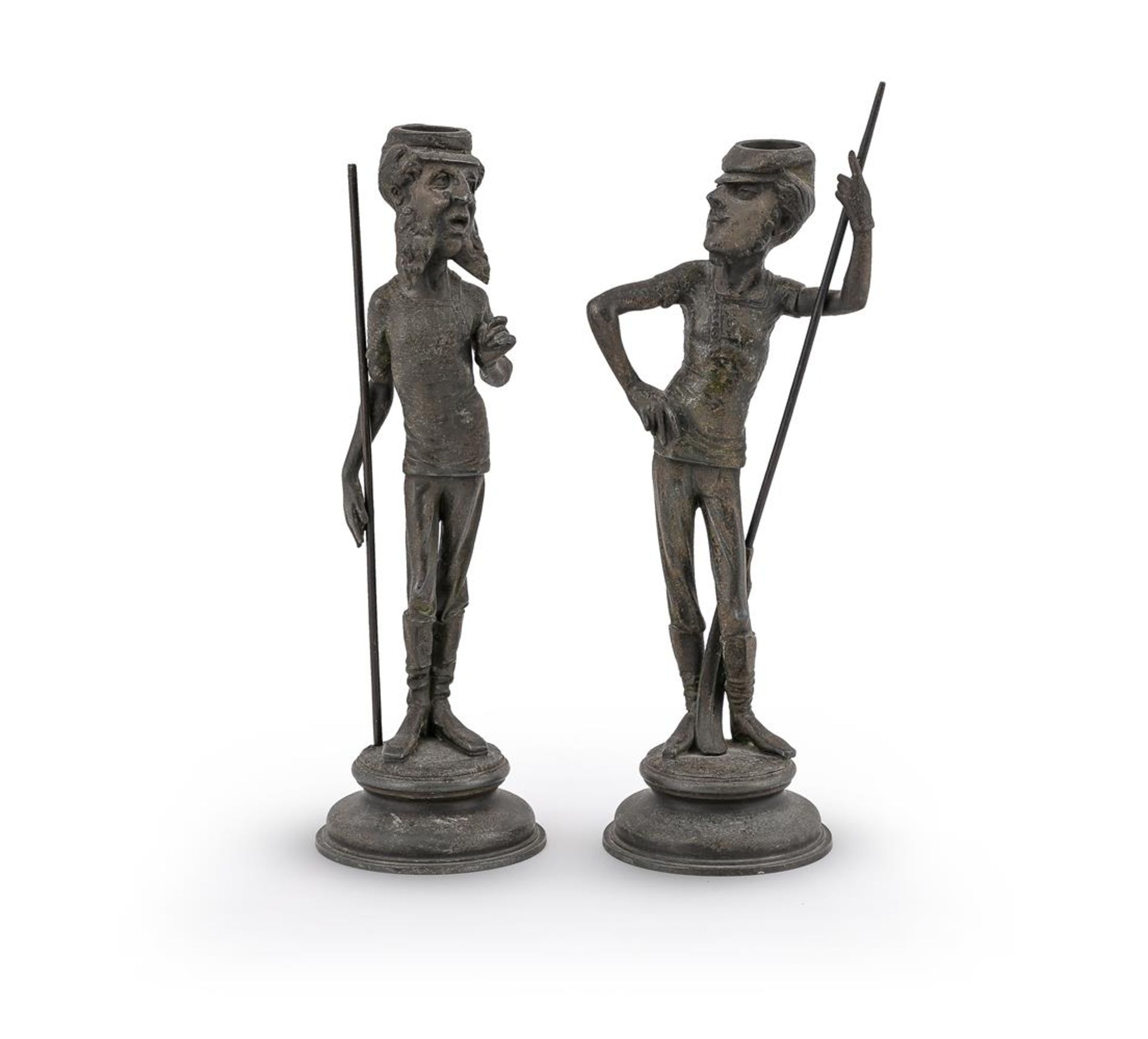 A PAIR OF SPELTER CANDLESTICKS