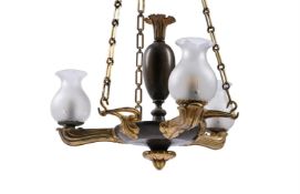 A GILT AND PATINATED METAL HANGING LIGHT IN REGENCY STYLE