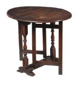 A WILLIAM AND MARY OAK GATE-LEG TABLE