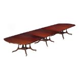 A MAHOGANY THREE PILLAR DINING TABLE, IN GEORGE III STYLE, OF RECENT MANUFACTURE