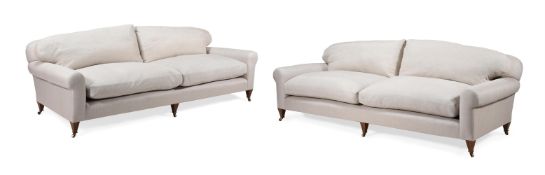 A PAIR OF MODERN GREY UPHOLSTERED SOFAS