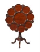 A GEORGE III MAHOGANY OCCASIONAL TABLE IN IRISH STYLE