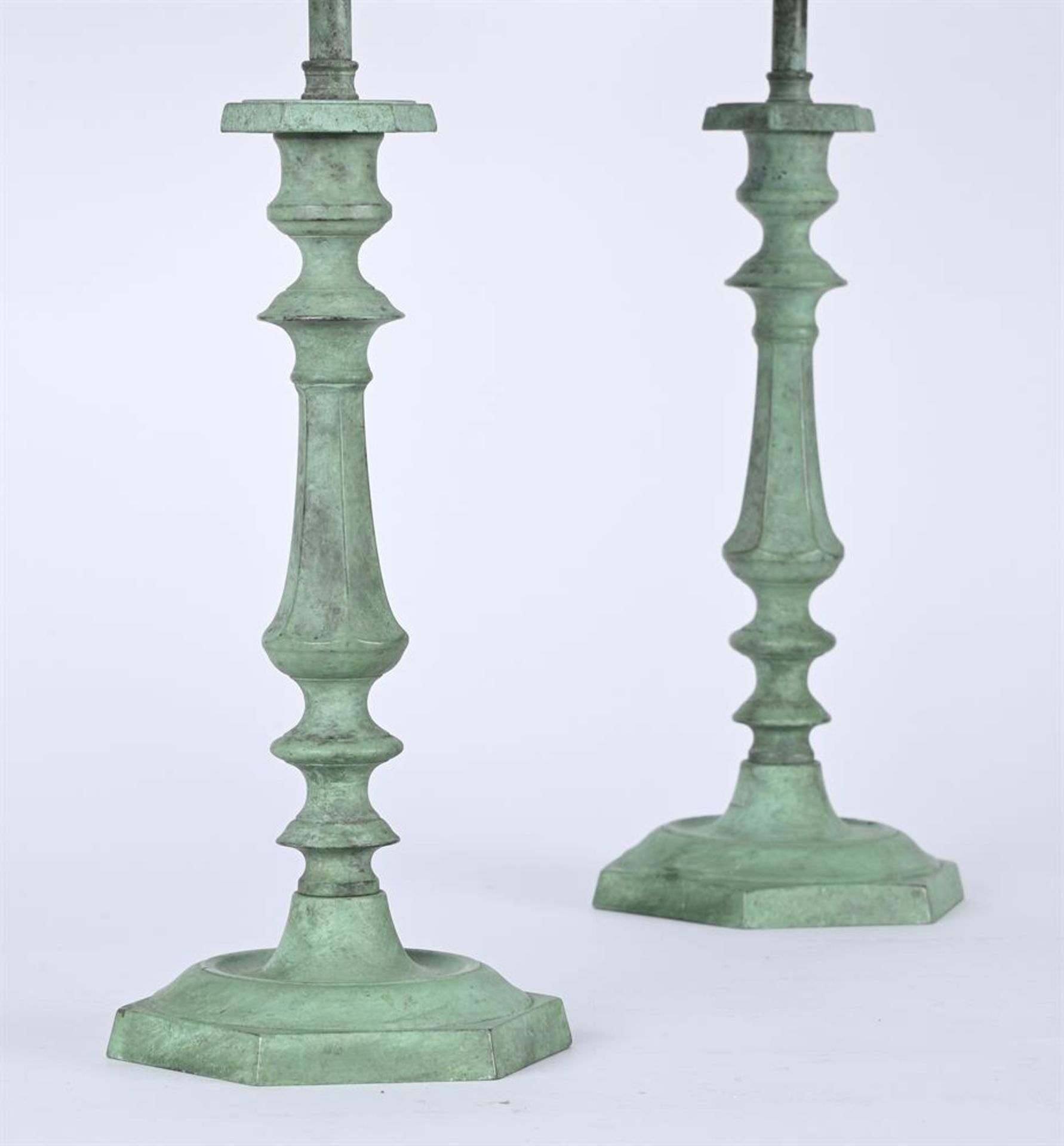 A PAIR OF VERDISGRIS PATINATED CANDLESTICKS - Image 2 of 2