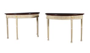 A PAIR OF PAINTED AND PARCEL GILT SERVING TABLE IN GEORGE III STYLE
