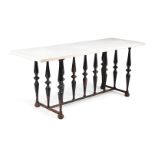 A CAST IRON AND WHITE MARBLE TOPPED CONSOLE TABLE