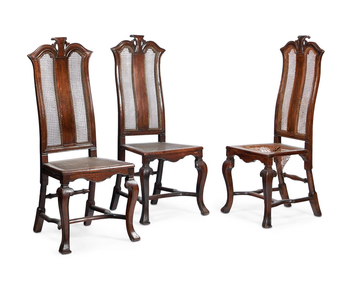 A SET OF THREE BEECH SIDE CHAIRS IN JAMES II STYLE