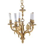 A GILT METAL FIVE LIGHT HANGING CHANDELIER