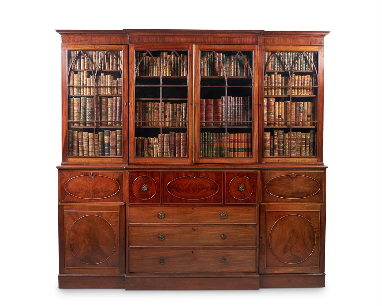 Y A MAHOGANY BREAKFRONT SECRETAIRE BOOKCASE, IN GEORGE III STYLE