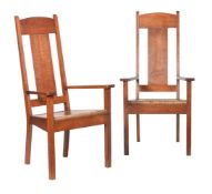 A PAIR OF OAK ARTS & CRAFTS ARMCHAIRS