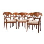 A SET OF SIX WALNUT DINING CHAIRS