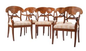 A SET OF SIX WALNUT DINING CHAIRS