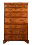 A GEORGE II WALNUT CHEST ON CHEST