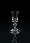 A SMALL BAULSTER GIN OR DRAM GLASS