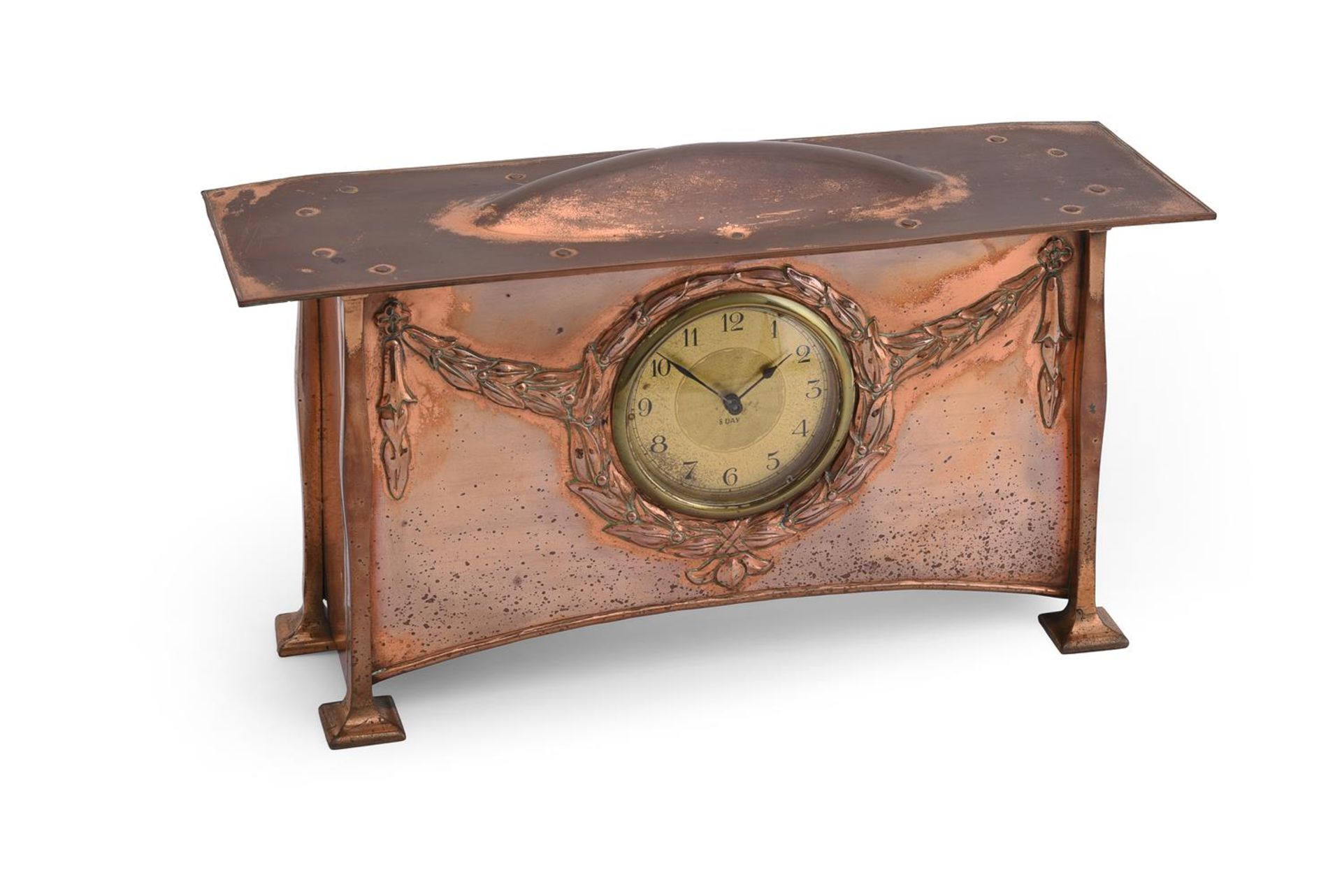 A COPPER MANTEL TIMEPIECE