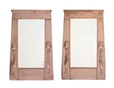 ARCHIBALD KNOX FOR LIBERTY, A PAIR OF ARTS AND CRAFTS COPPER WALL MIRROR