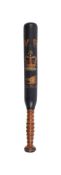 A VICTORIAN BLACK AND POLYCHROME DECORATED TRUNCHEON