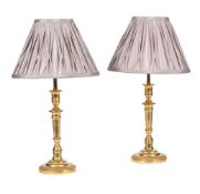 A PAIR OF GILT METAL TABLE LAMPS IN LOUIS XVI STYLE
