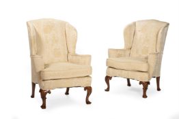 A PAIR OF WALNUT WING ARMCHAIRSIN GEORGE I STYLE