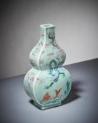 A Chinese Famille Rose celadon ground 'Dragon' vase