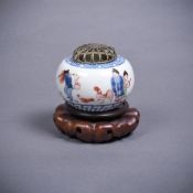 A small underglaze blue and enamelled water pot