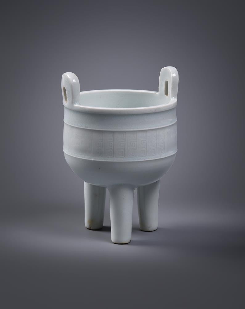 A Chinese Dehua tripod censer