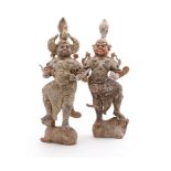 Two painted pottery figures of Lokapala