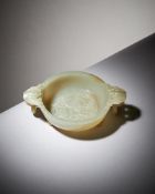 A Chinese celadon jade 'Marriage' bowl