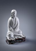 A rare Chinese Dehua model of seated Guanyin
