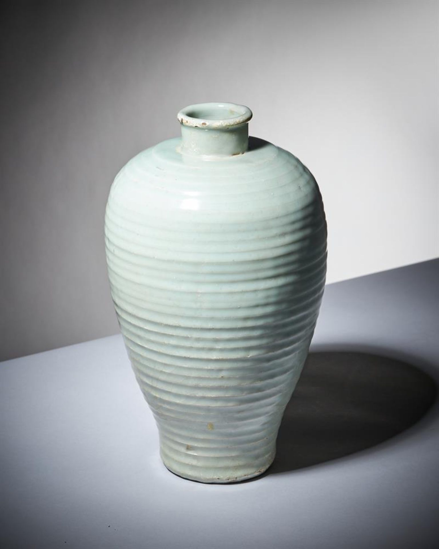 A Chinese pale celadon ribbed vase - Image 2 of 13