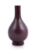 A small Chinese 'iron-rust' glazed bottle vase