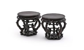 A good pair of Chinese hardwood circular stands