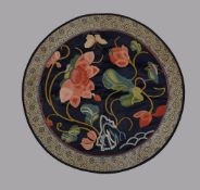 A Chinese embroidered silk roundel